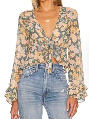 Free People green floral ruffle top.